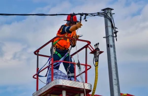 A technician fixing a Grid Bottleneck