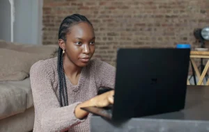 Young black girl on laptop