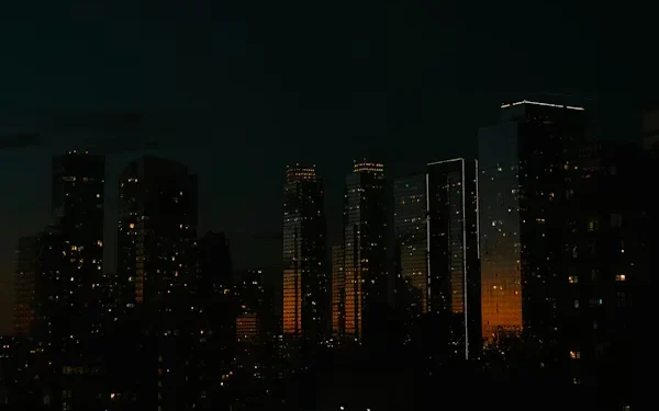 African city skyline partially darkened to represent internet shutdowns impacting digital infrastructure.