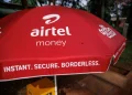 Airtel Money branding displayed outside on an umbrella