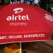 Airtel Money branding displayed outside on an umbrella