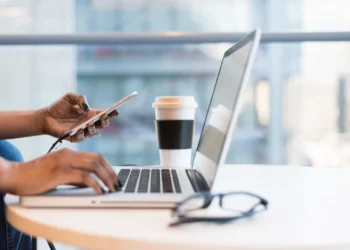 Techsoma Africa A software developer working remotely in an African city, part of a growing trend of engineers staying physically present while working for foreign employers