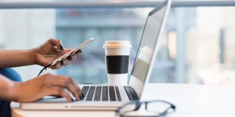 Techsoma Africa A software developer working remotely in an African city, part of a growing trend of engineers staying physically present while working for foreign employers