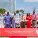 Chief Diana Chen of CIG Motors Group hands over 10 vehicles to LSSTF Executive Secretary Dr Ayodele Ogunsan in Victoria Island, Lagos