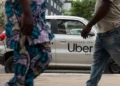 A ride-hailing driver in Lagos traffic, one of thousands affected by Uber's sudden departure from Nigeria