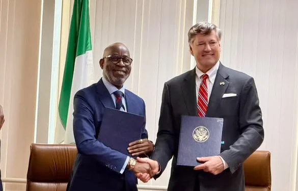 An image of a Nigerian minister and a US representative